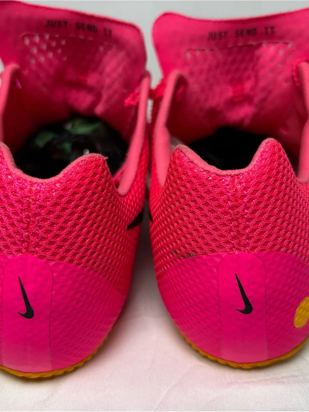 Nike Bright Pink Athletic track with Black Swoosh men’s 10/1/2